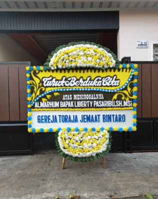 Papan Bunga Duka di Tigapanah